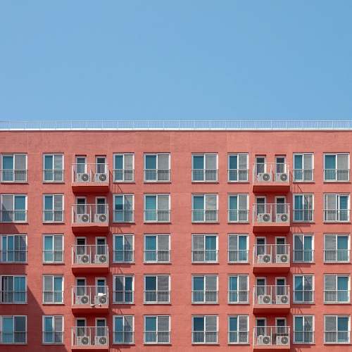 high rise brown high-rise building urban
